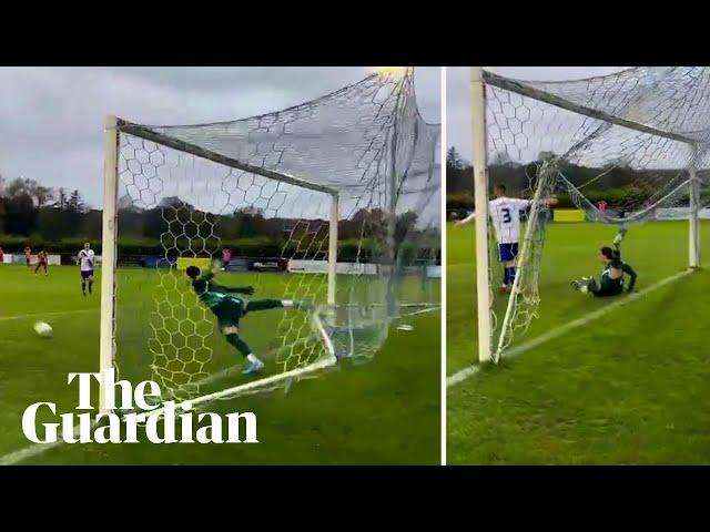 Goalkeeper pulls off amazing save despite getting his foot trapped in the net