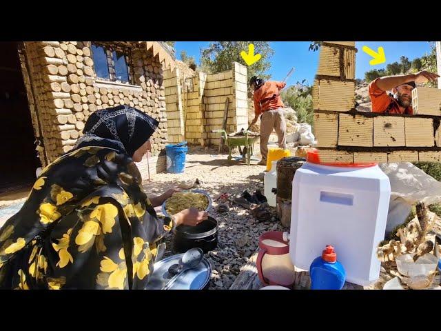 A nomadic mother's efforts to build a shelter and toilet in the mountains
