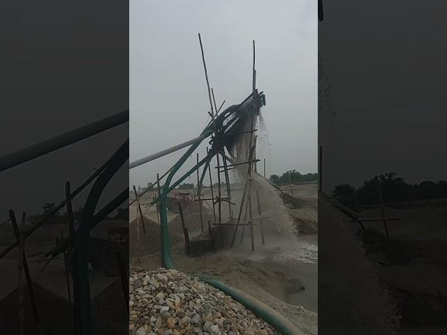 taking out of Rock and sand ,from the shampa River.