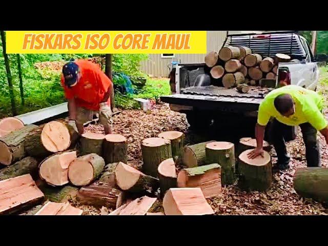 Busting red oak FIREWOOD rounds in half W/Fiskars maul