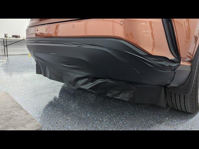 Lexus rear lower trim wrapped in Hexis Satin deep black vinyl