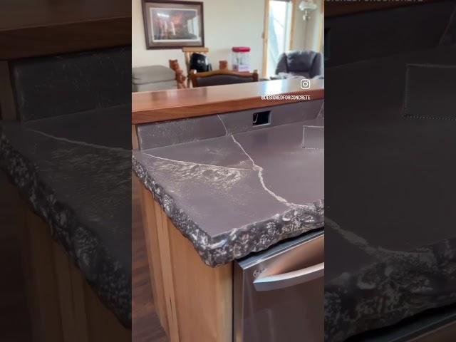 Concrete countertops: Rock edge molding, integrated drain board and cutting board.