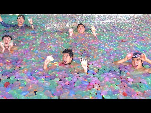 What happens when you put 55,000 water balloons in a pool!?