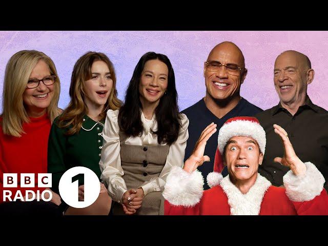 "I *know* this one!"  The Rock and the Red One cast take Ali Plumb's Christmas Movie Quiz