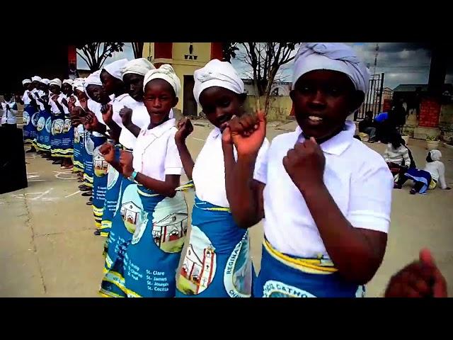 Chawama Regina Pacis Parish Holy Childhood played by the best kid guitarists and bassists in Zambia.