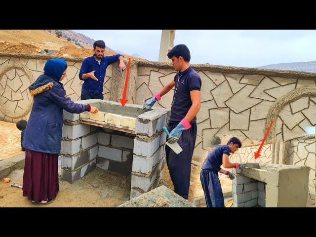 The art of building a fireplace with blocks: An experience from Master Rostam