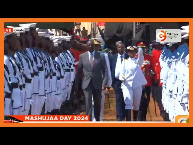 President William Ruto inspects guard of honour during 61st Mashujaa Day celebrations in Kwale