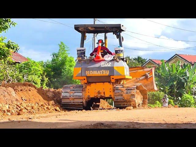 Dozer Operator and Big Truck develop rural road