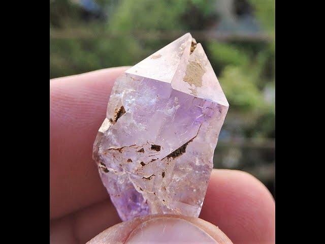 Terminated Amethyst crystal with Hematite inclusions mineral specimen from Teshovo in Bulgaria.