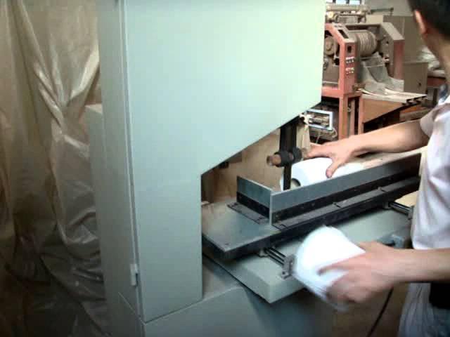 Toilet paper cutting machine