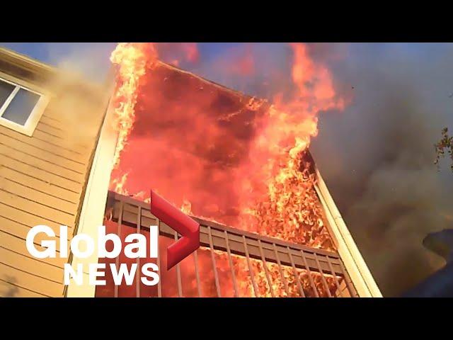 Dramatic footage captures what it's like for a firefighter responding to an apartment fire