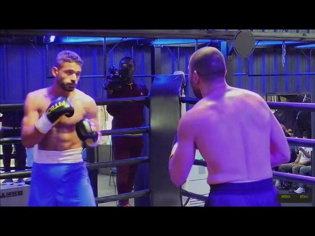 Ahmed Hendy (black trunk) vs Ahmed Anshraf (blue/white trunk)