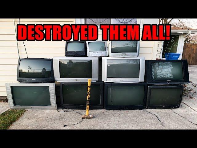 SMASHING A WALL OF GIANT TVS! DESTROYING ELECTRONICS!!