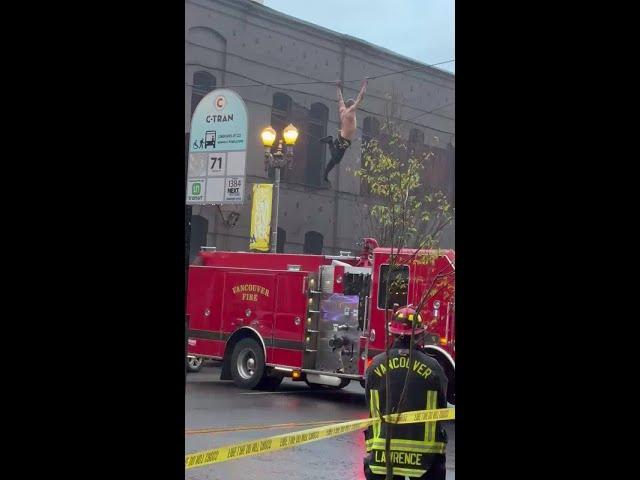 Man crosses wires in Vancouver, falls onto fire truck