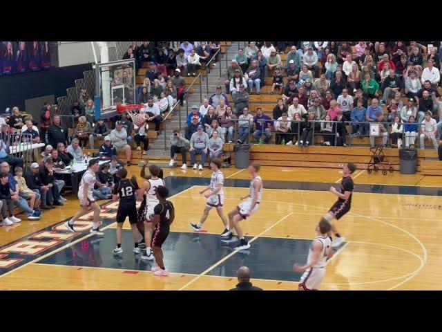 Mason Loyd scores a fastbreak layup