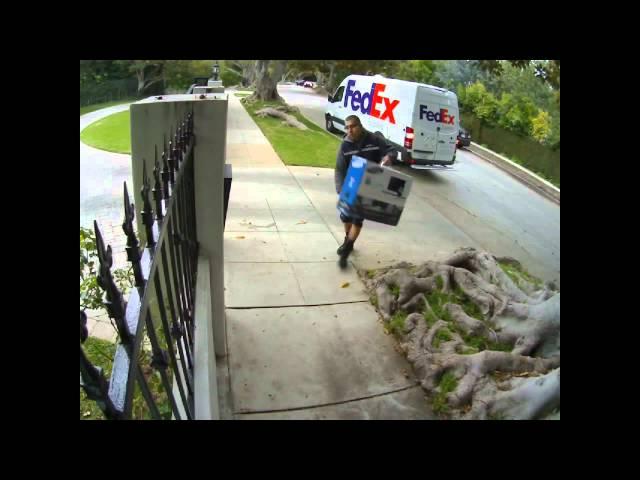 FedEx Guy Throwing Computer Monitor into a HOUSE...