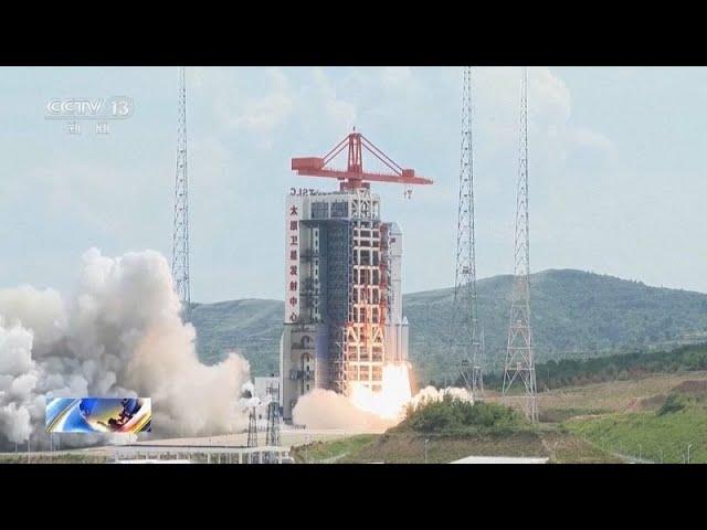 China says it has launched 18 satellites into space