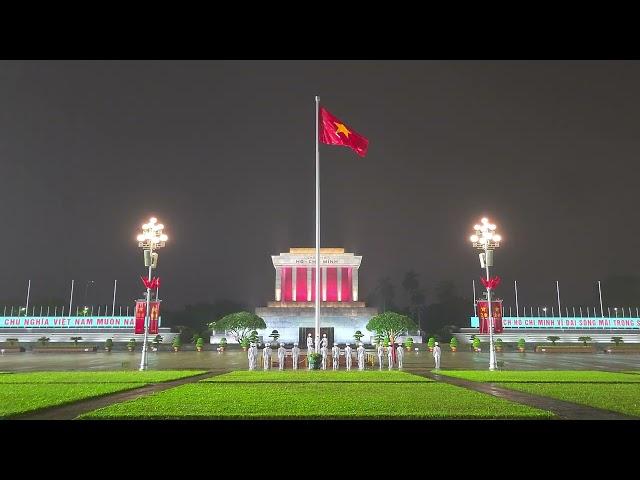 Rainy lowering flag ceremony in Vietnam