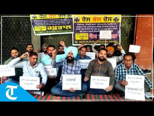 Cooperative bank employees protest over 6th pay commission outside RCS office in Chandigarh