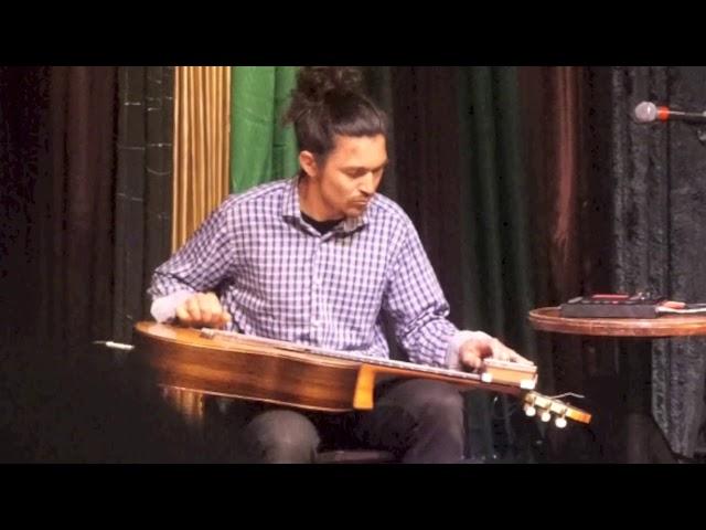 Johannes Rath performs his music with classical guitar & kalimba