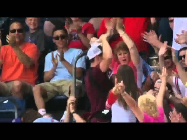 Dad's terrific foul ball catch with baby attached to chest