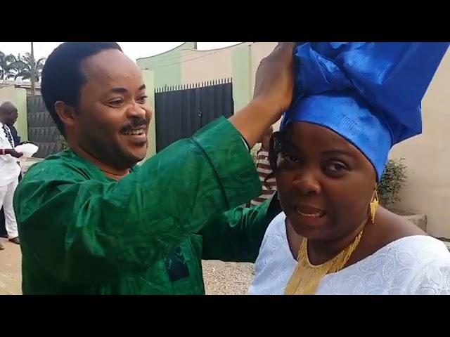 Prof. Doyin Hassan shows off his Gele Tying skill