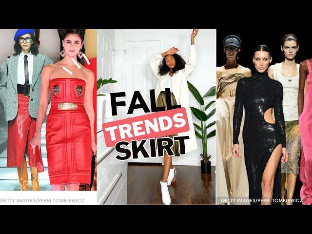 Fall 2022 style trends according to Cosmopolitan magazine. White books, midi skirt, HM jacket