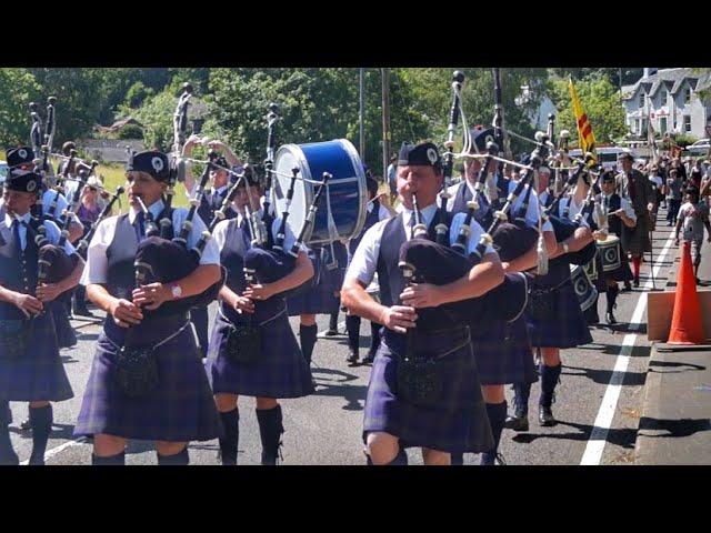 Badenoch & Strathspey Pipe Band Leading the Clan March during 2013 Lochearnhead Highland Games