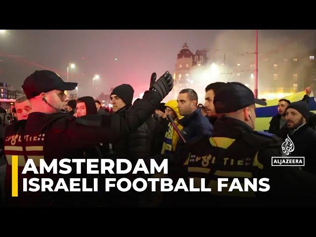 Israeli football fans clash with protesters in Amsterdam