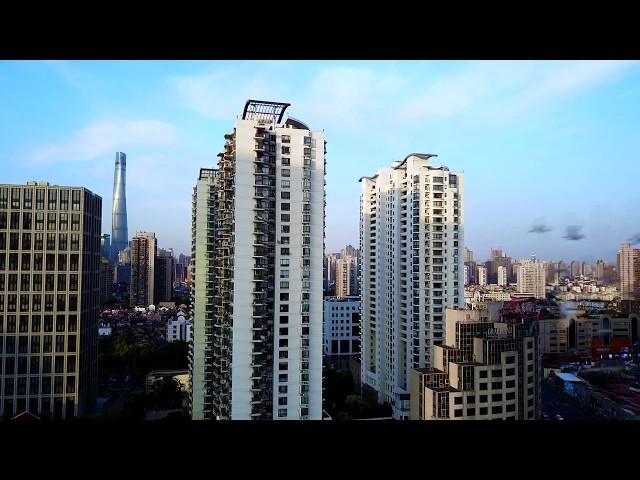 Drone Footage Window Start and Land 20th Floor Shanghai 4K