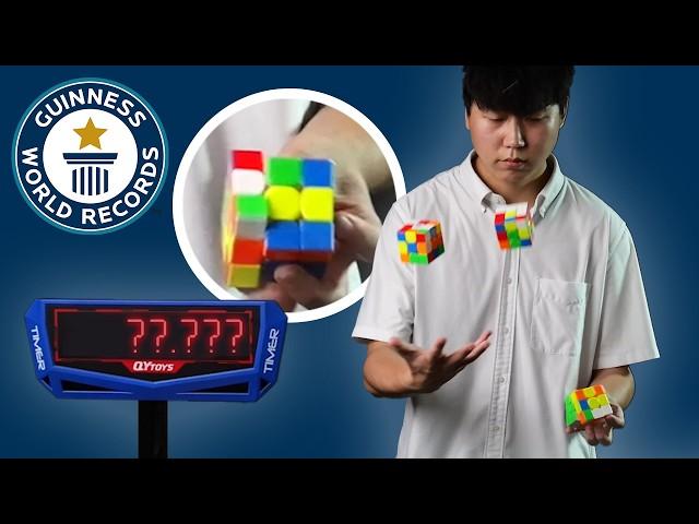 Fastest Juggle and Solve of Three Cubes EVER! - Guinness World Records