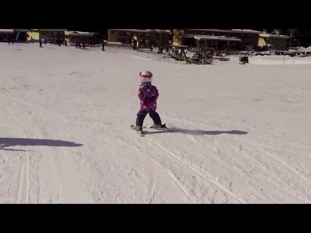 Four years old Luizka skiing in France. January 2014