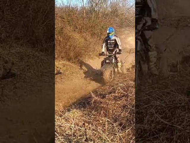 Three Wheeler Jump into Mud Puddle