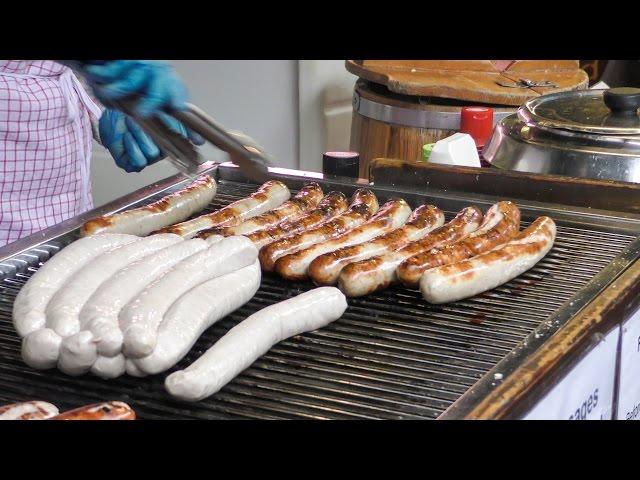 German Bratwurst Sausage Tasted in London Street. Borough Market