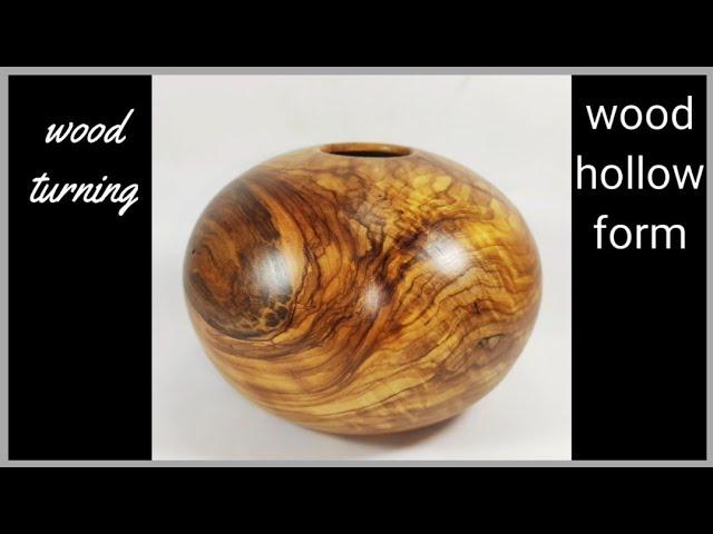 wood turning a olivewood hollow form