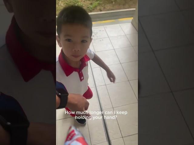 "A tender farewell as I hold your hand, my little one. #SchoolDays #CherishedMoments"