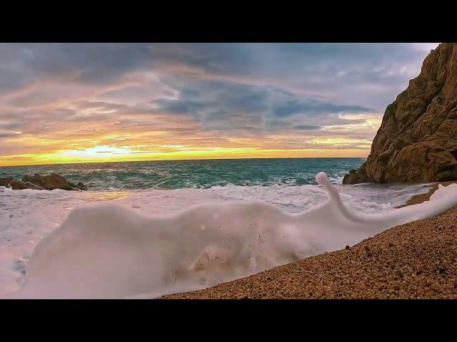 Majestic Sunrise Amidst Strong Waves and White Foam