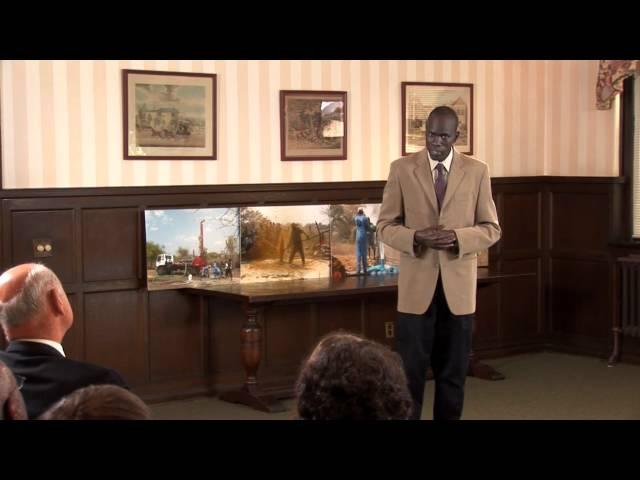 Salva Talks with Adults about Water for South Sudan