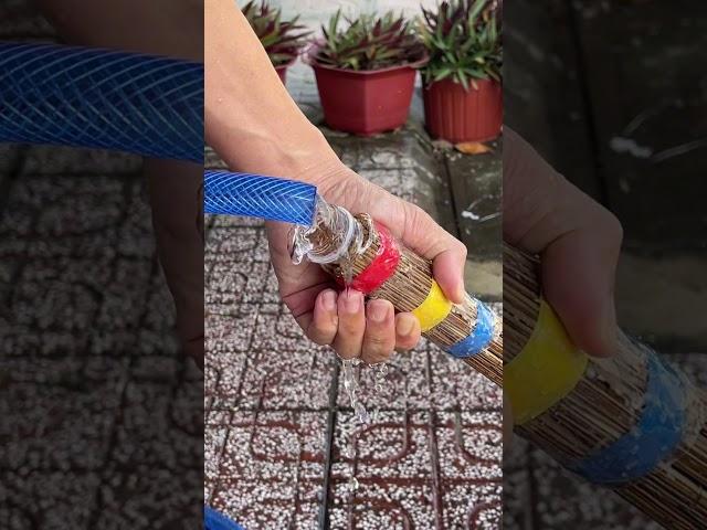 A brilliant tech hack using a broom and a water pipe.