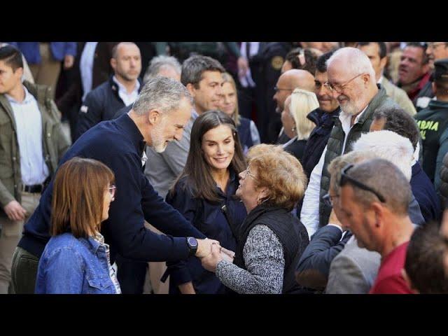 Spain's royals return to flood-hit region weeks after being pelted with mud