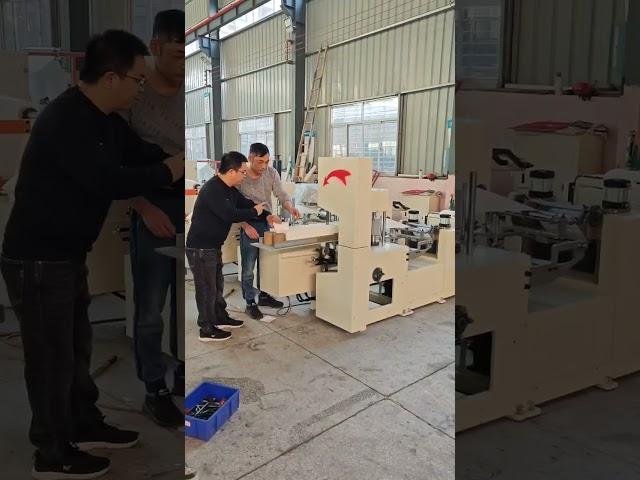 Napkin paper folding and making machine