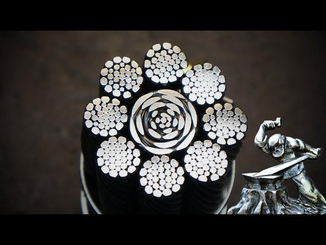 Damascus steel from rope. Steel flowers on the blade.