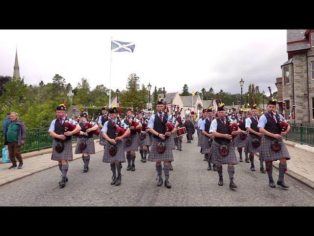 "Scotland the Brave" by the Isle of Cumbrae Pipe Band as they march out of Braemar, Scotland