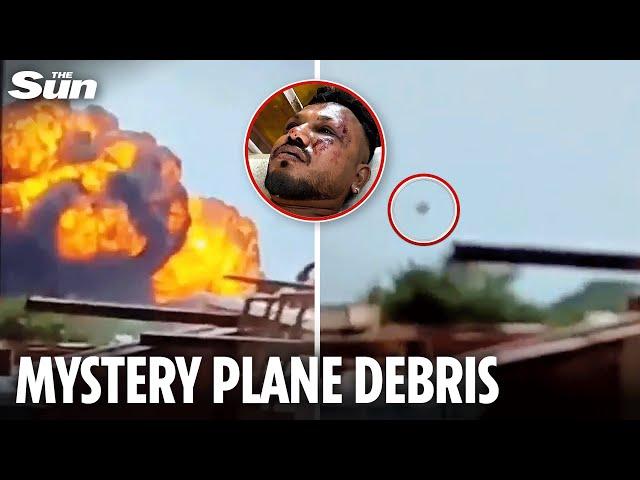 Is THIS what saved Brit Air India survivor? Footage shows mysterious debris falling from jet