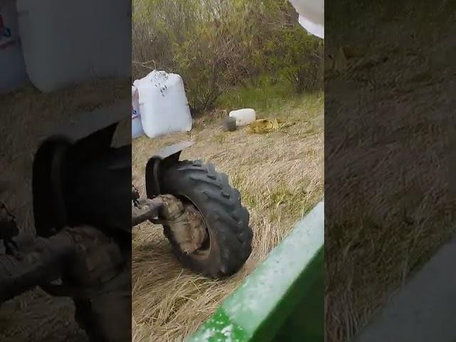 загрузка удобрений в разбрасыватель