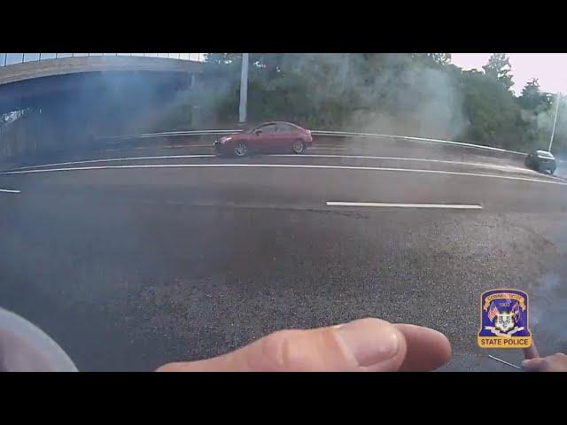 Connecticut state trooper nearly hit by hydroplaning vehicles