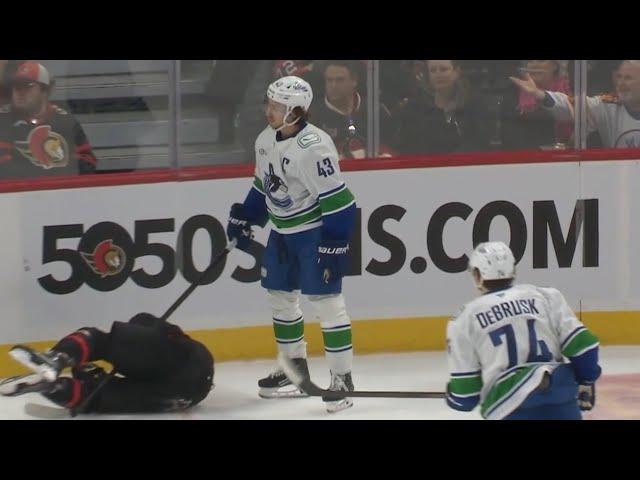 Quinn Hughes Game Misconduct for Boarding Josh Norris