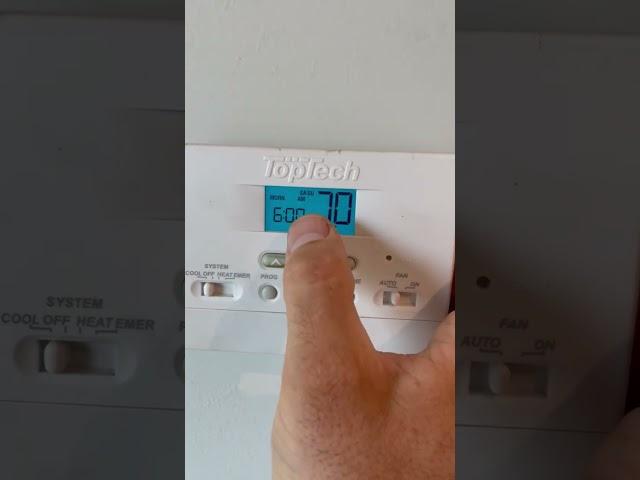 Atlas Apartments: How to program the TopTech thermostat?