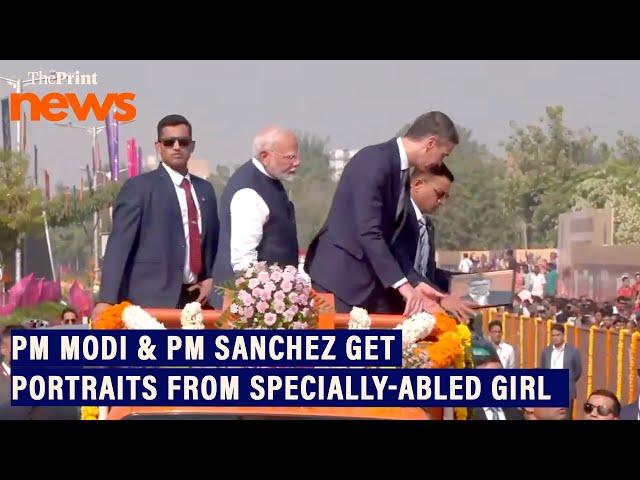 A specially-abled girl presented portraits of PM Modi and PM Pedro Sanchez during their roadshow