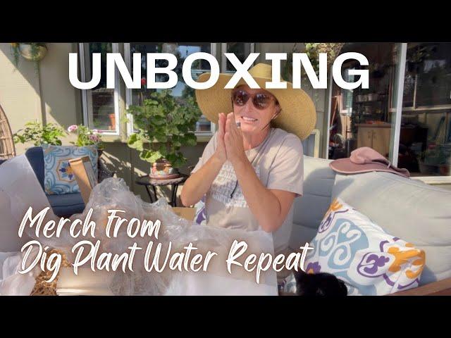 Unboxing merch from Dig Plant Water Repeat! 